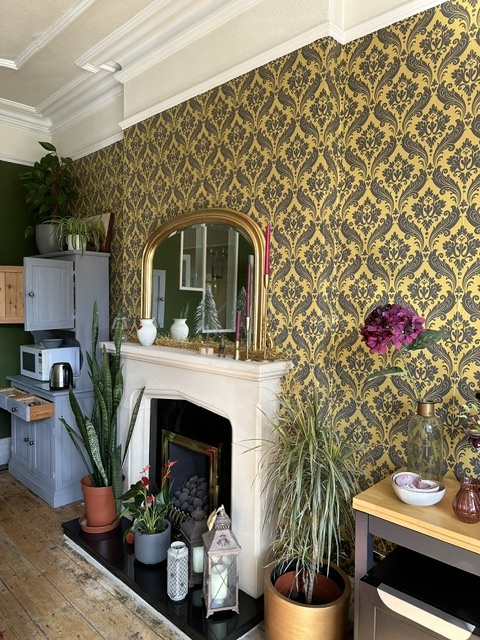 The dining room, with a fireplace and a microwave for guest use