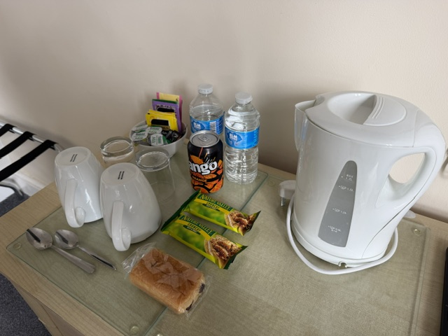 In-room tea, coffee and a croissant or breakfast bar